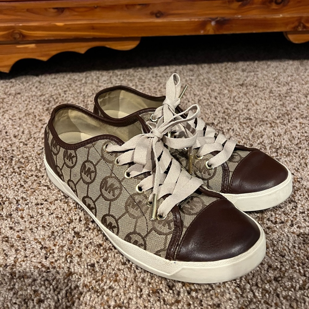 Michael Kor’s size 8.5 lightly worn sneakers.